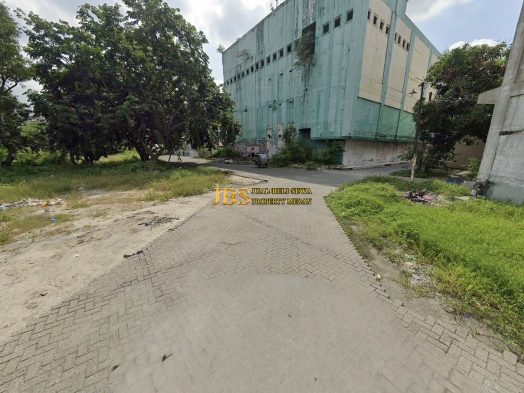 Dijual Tanah & Bangunan di Jalan Yos Sudarso - 